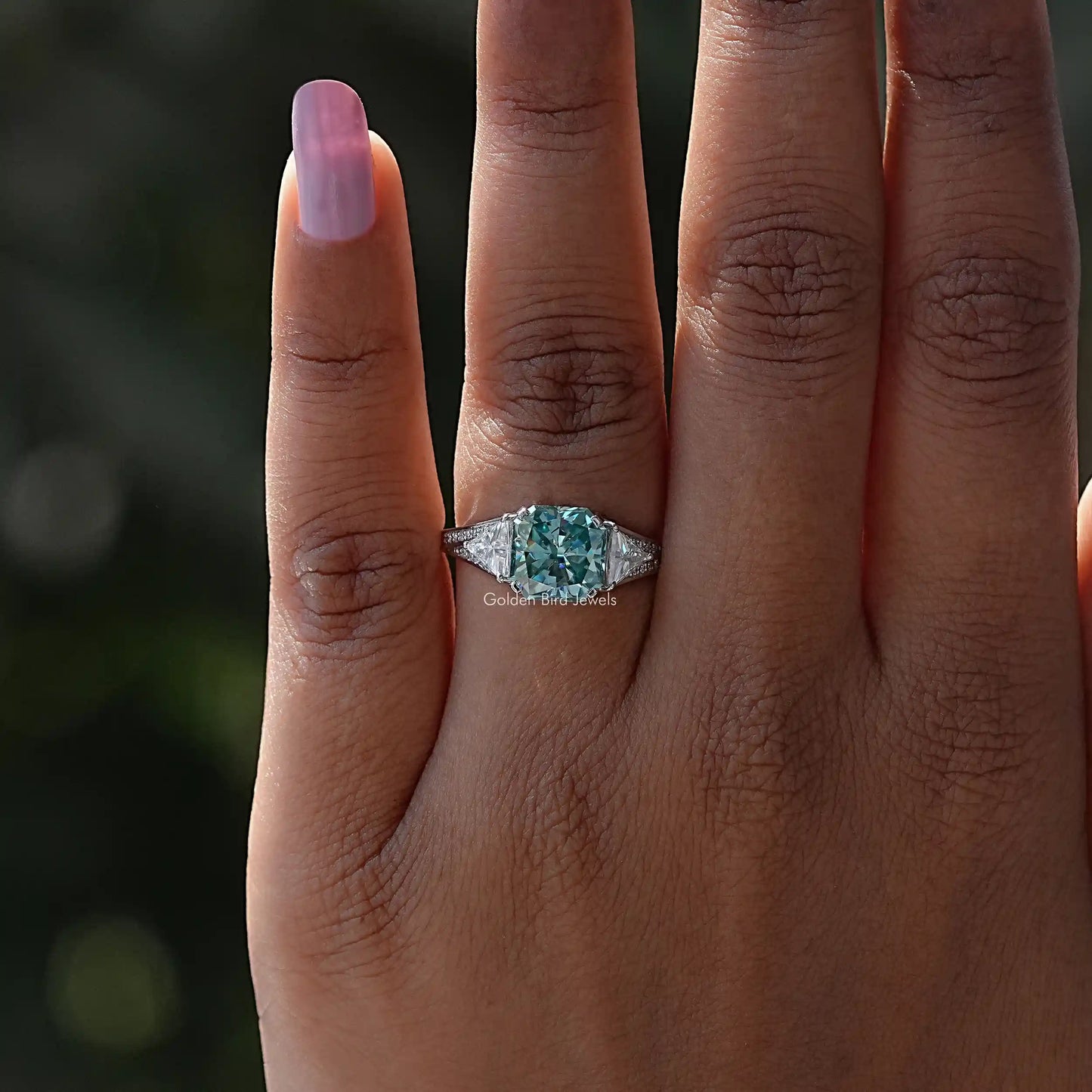 Close-Up View of Blue Radiant Cut Moissanite Accent Stone Ring