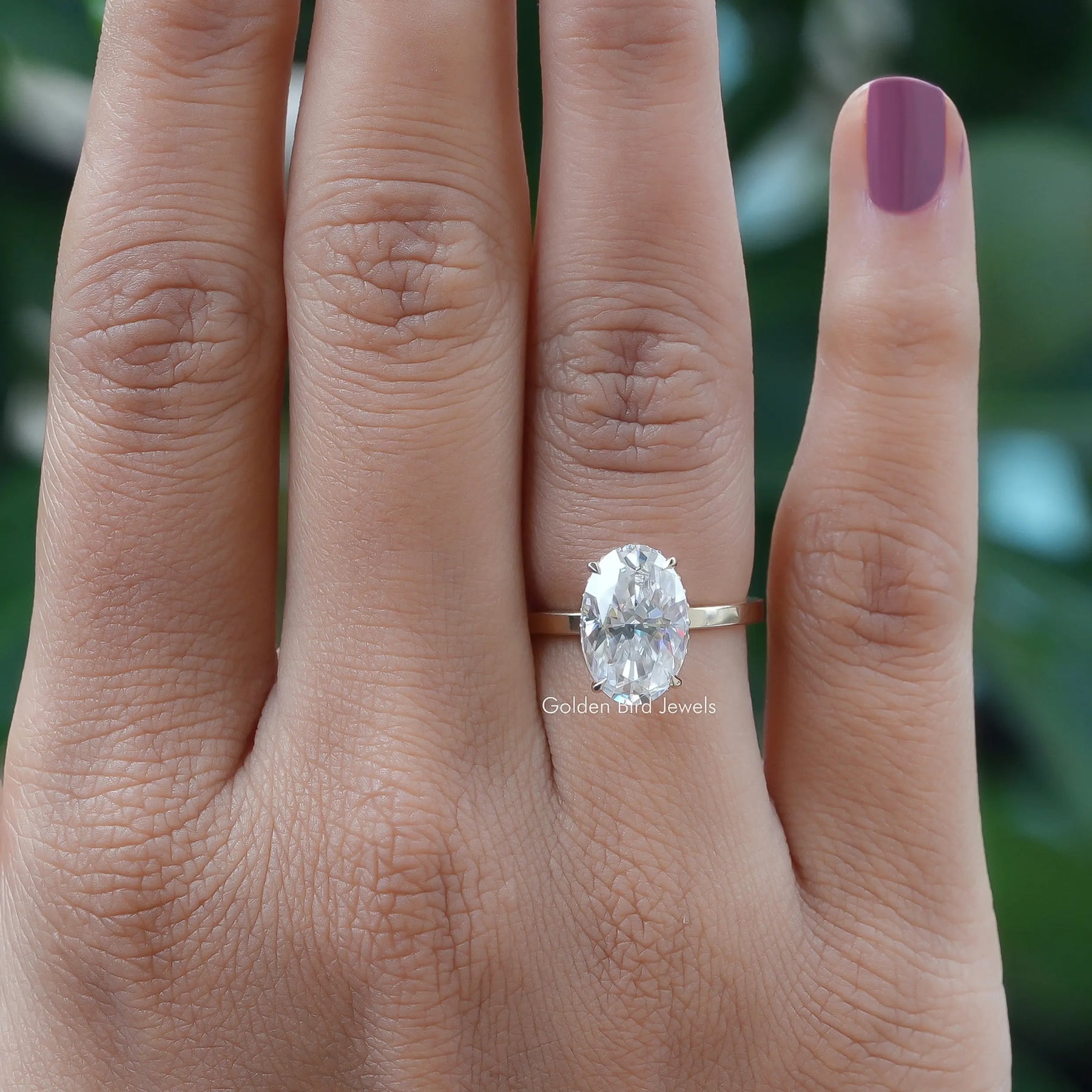 Oval Cut Solitaire Hidden Halo Ring