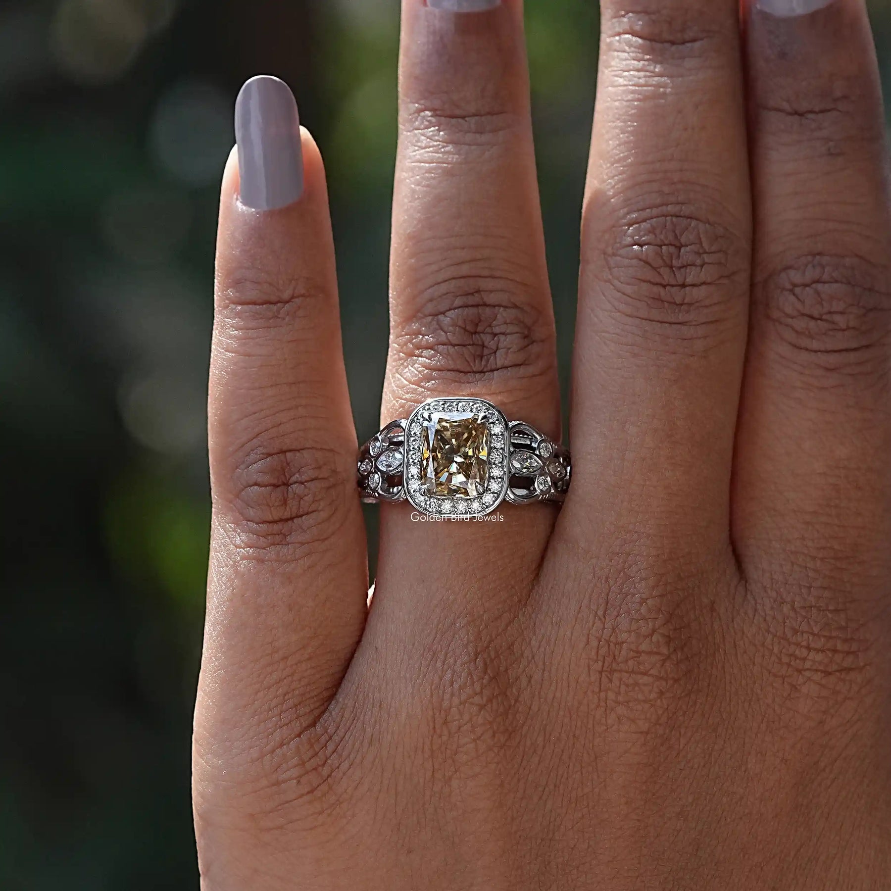 View of Moissanite Cushion And Marquise Cut Ring In finger