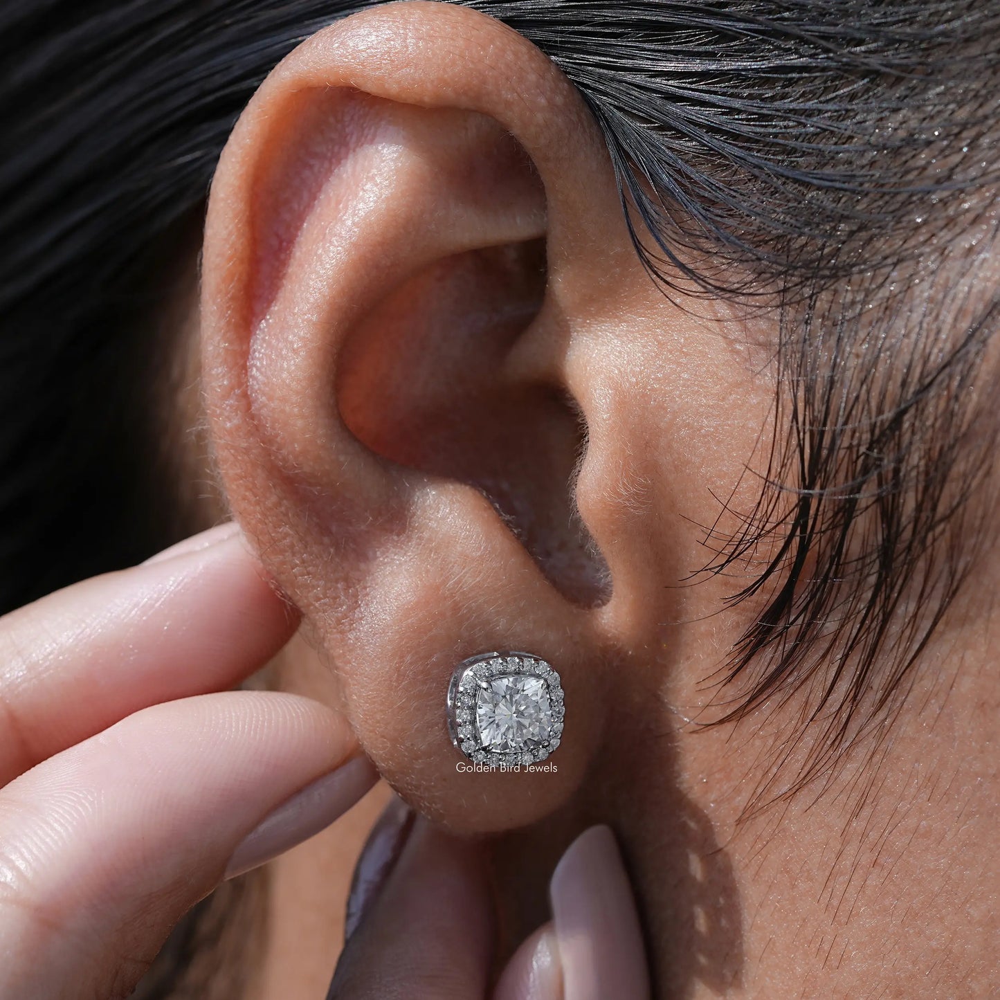 Detailed view of moissanite earrings in secure setting 