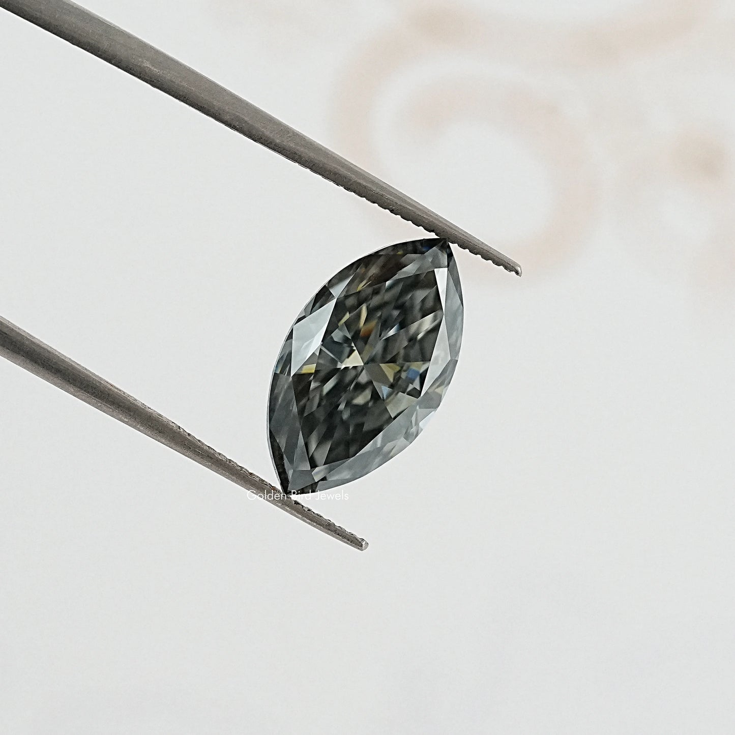 tweezers  View of Marquise Cut Moissanite Loose 