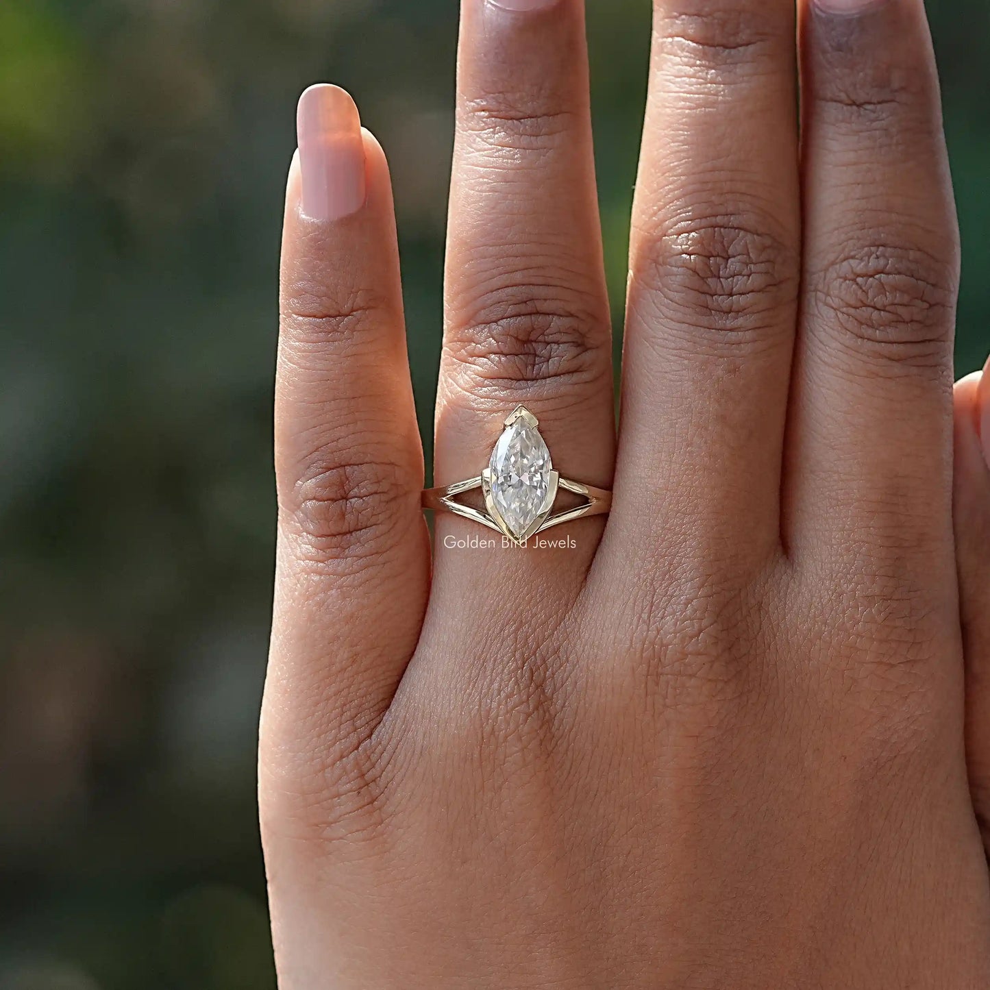 View of Solitaire Marquise Cut Moissanite Ring In Yellow Gold