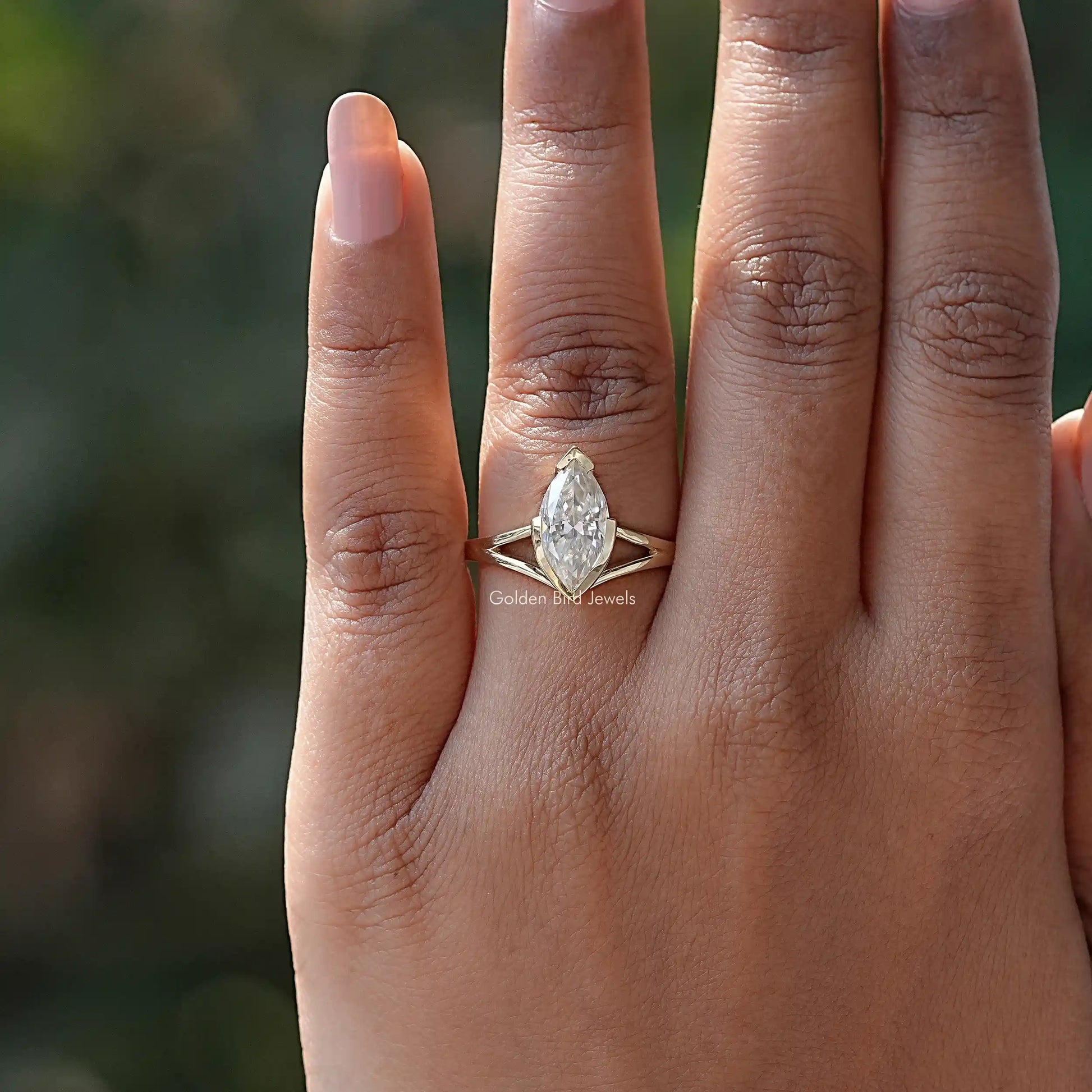 View of Solitaire Marquise Cut Moissanite Ring In Yellow Gold