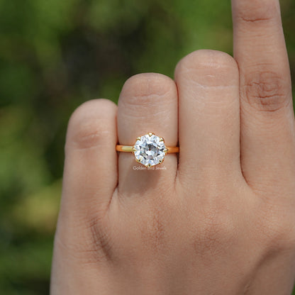 In finger view of Round Cut Solitaire Engagement Ring