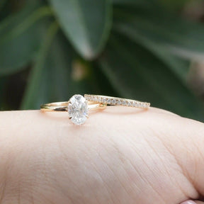 Colorless Oval Cut Hidden Halo Wedding Ring Set