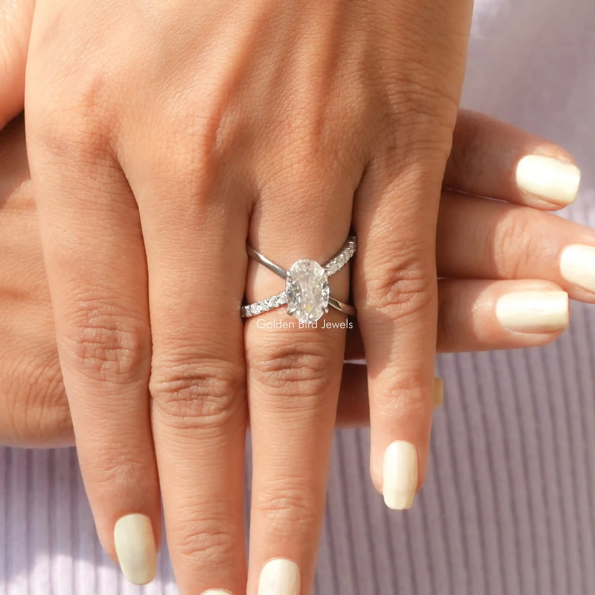 Close-Up View of Split Shank Oval Moissanite Ring In White Gold