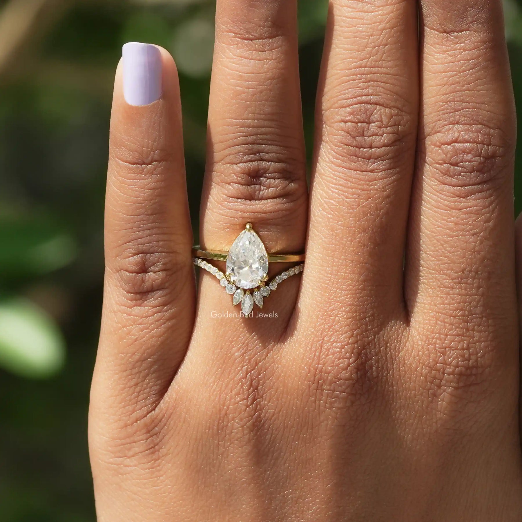 View of Pear Cut Moissanite Ring Set In finger