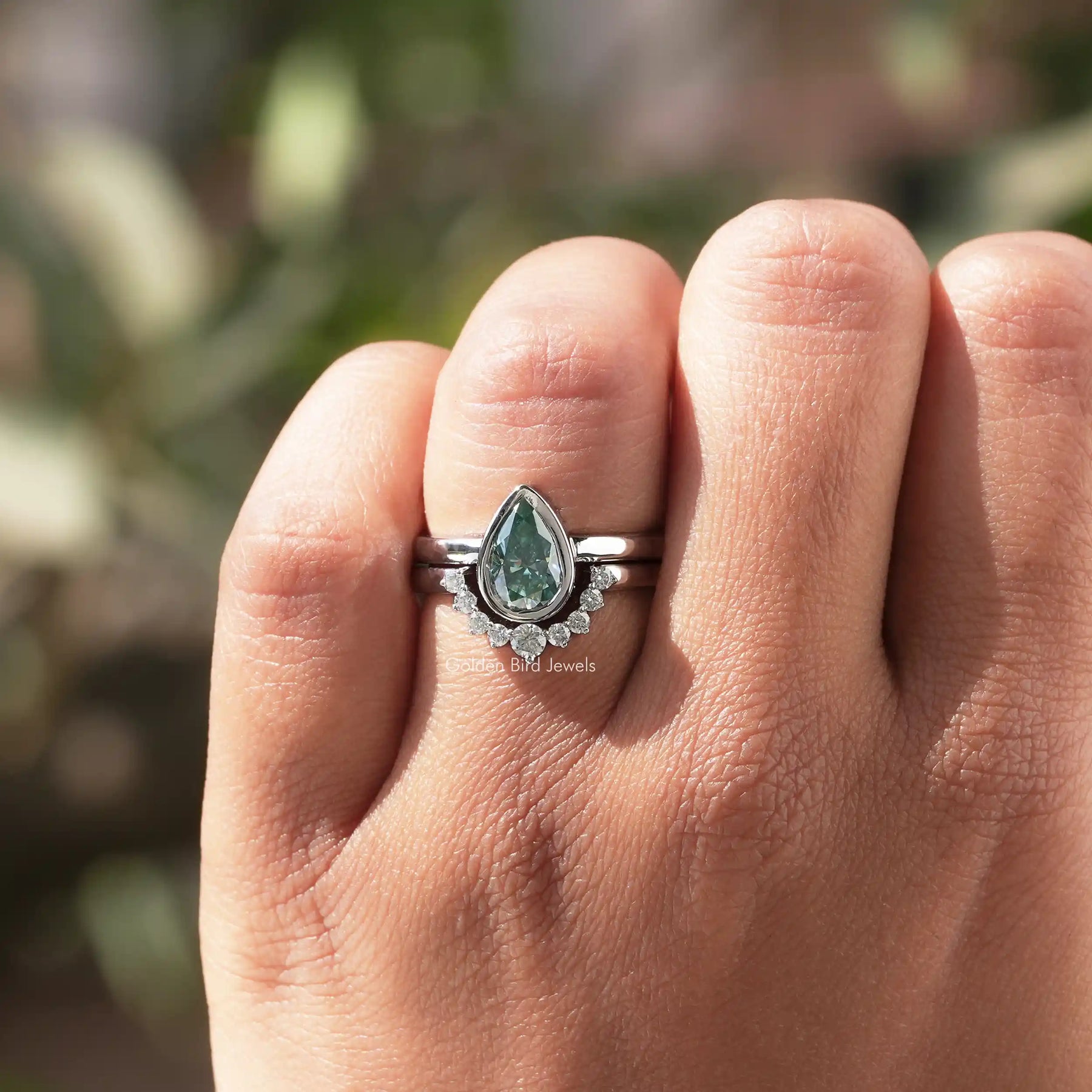 Close-Up View of Pear Cut Moissanite Bridal Ring Set In White Gold