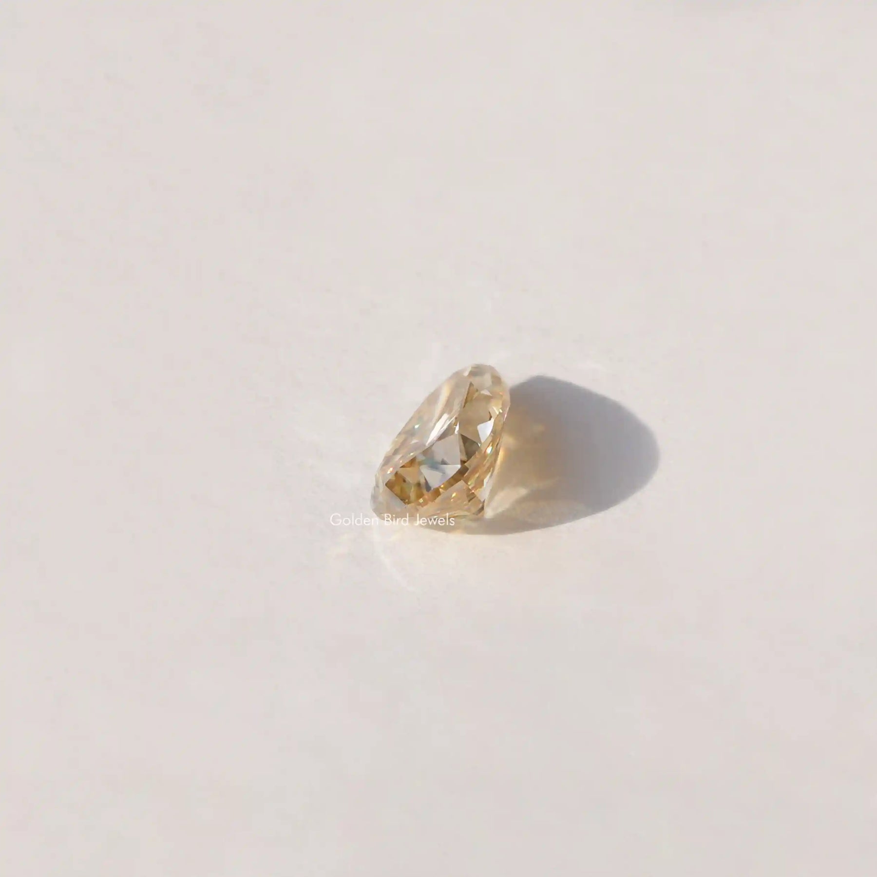 [Side view of old mine pear cut loose stone]-[Golden Bird Jewels]