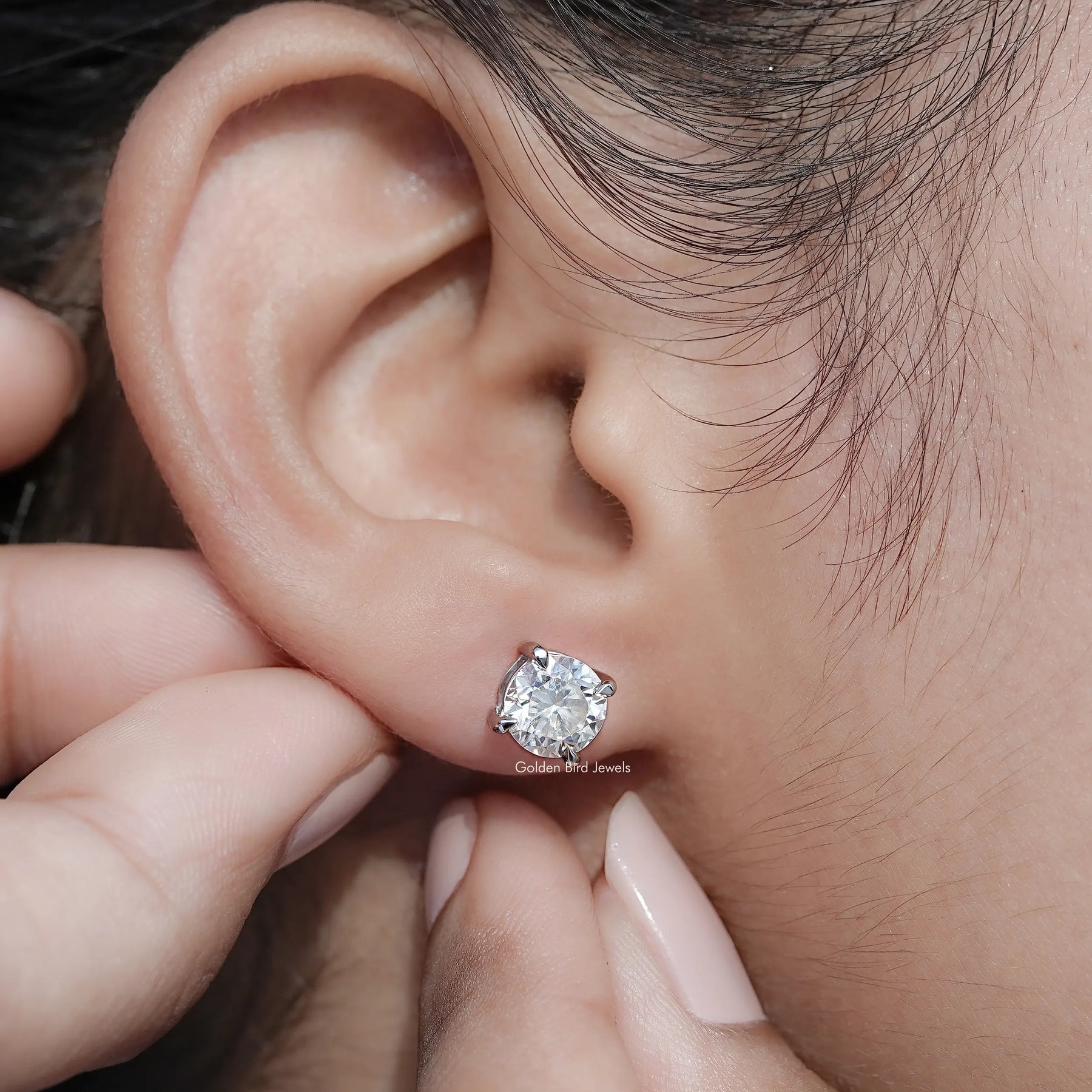 Detailed view of Round Shaped Moissanite Stud Earrings in secure setting 