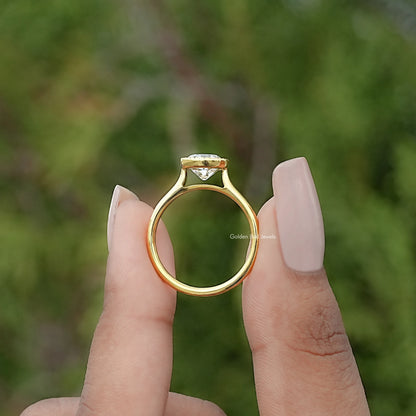 Back view of Round Cut Solitaire Engagement Ring in secure setting