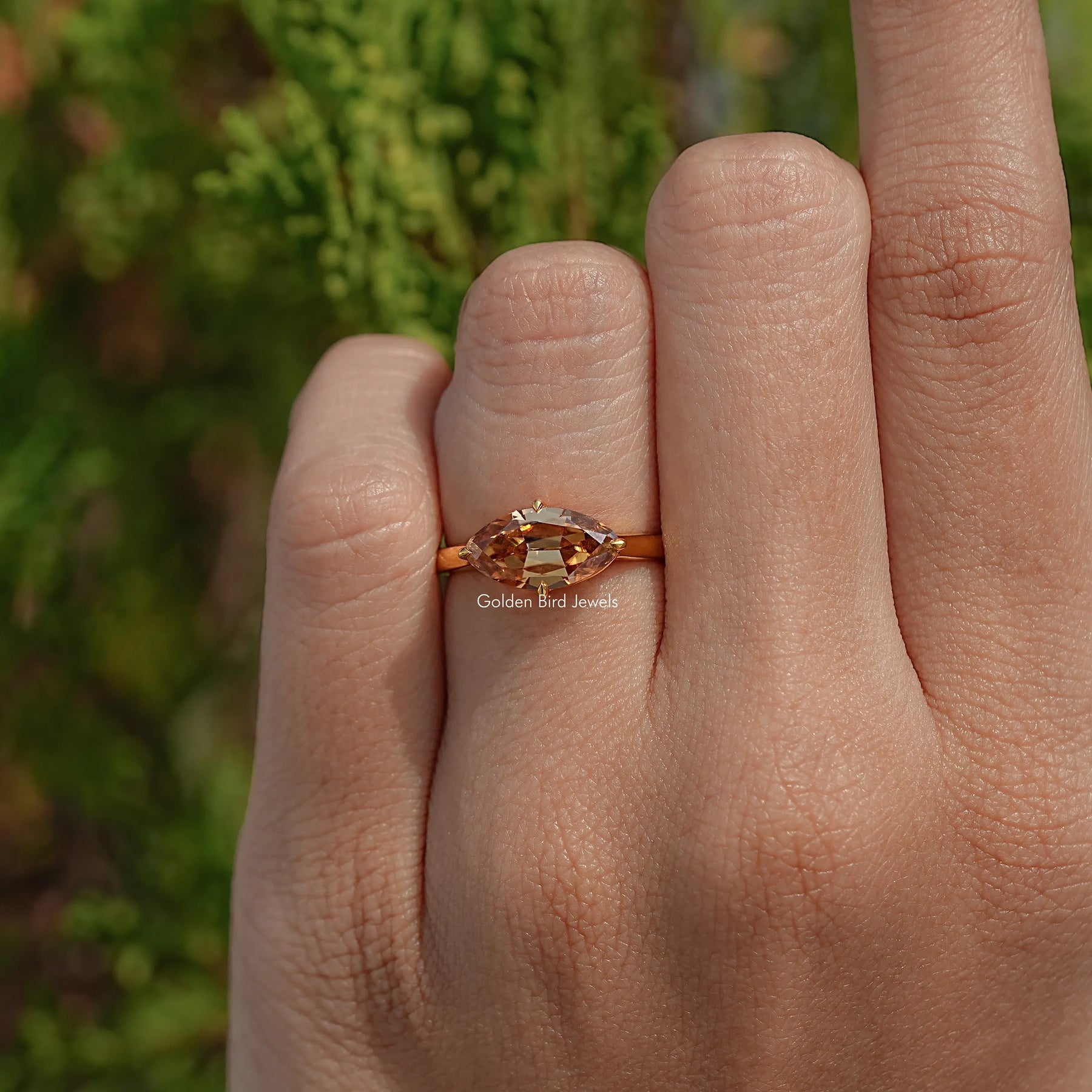 Top View Of Champagne East West Old Mine Moval Moissanite Ring