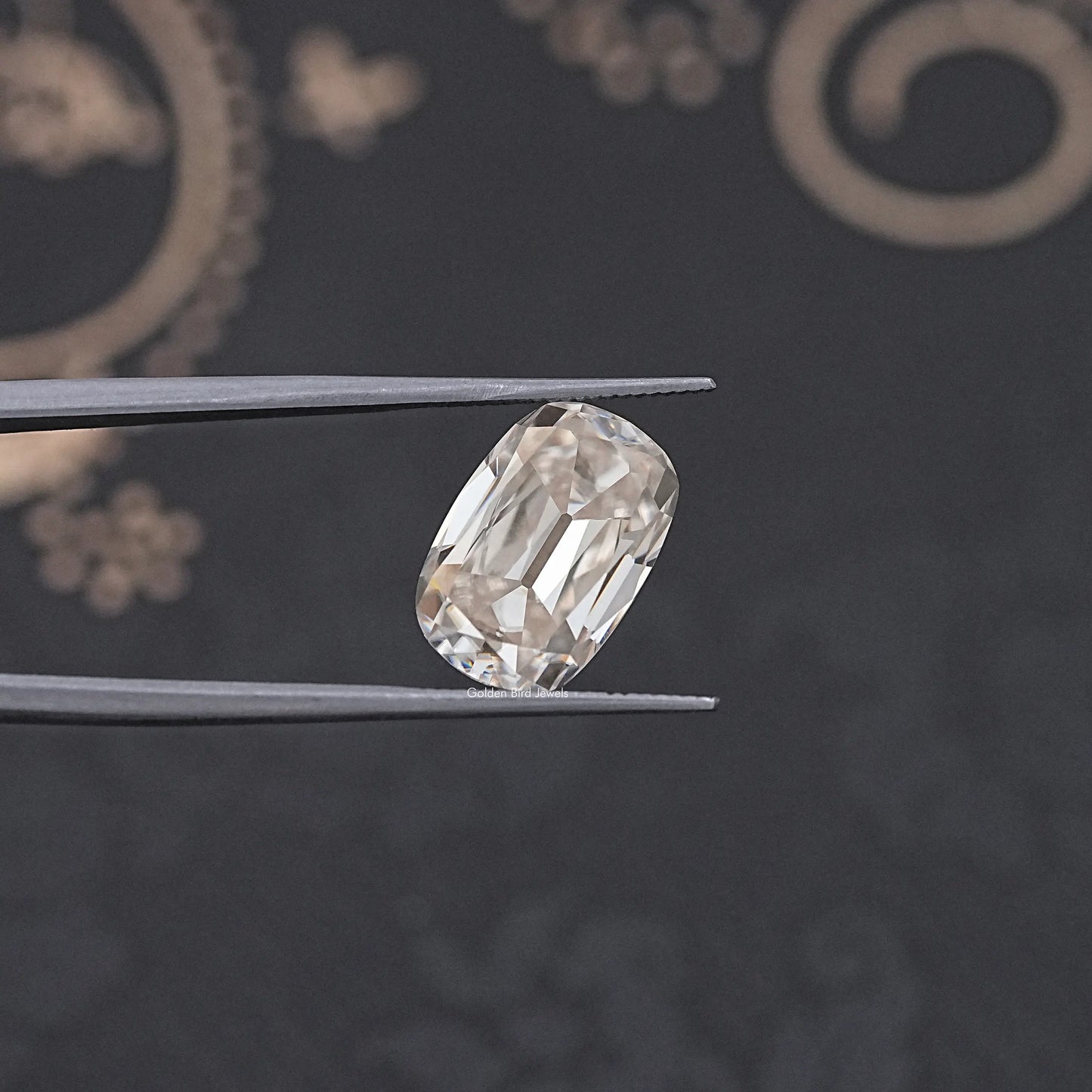 tweezers  View of Cushion Old Cut Moissanite Stone for Anniversary Rings