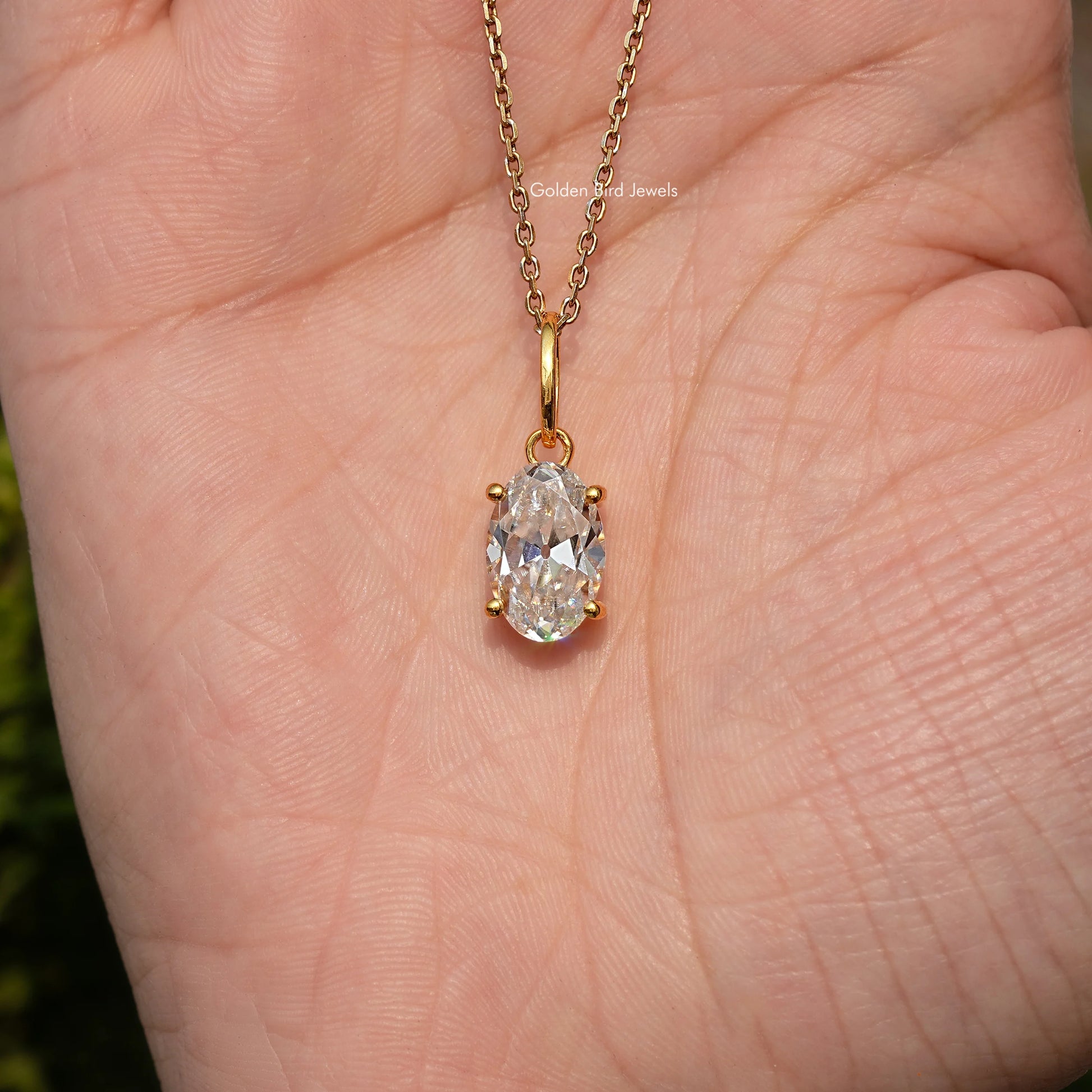 Close View Of Old Mine Oval Moissanite Pendant in Secure Setting 