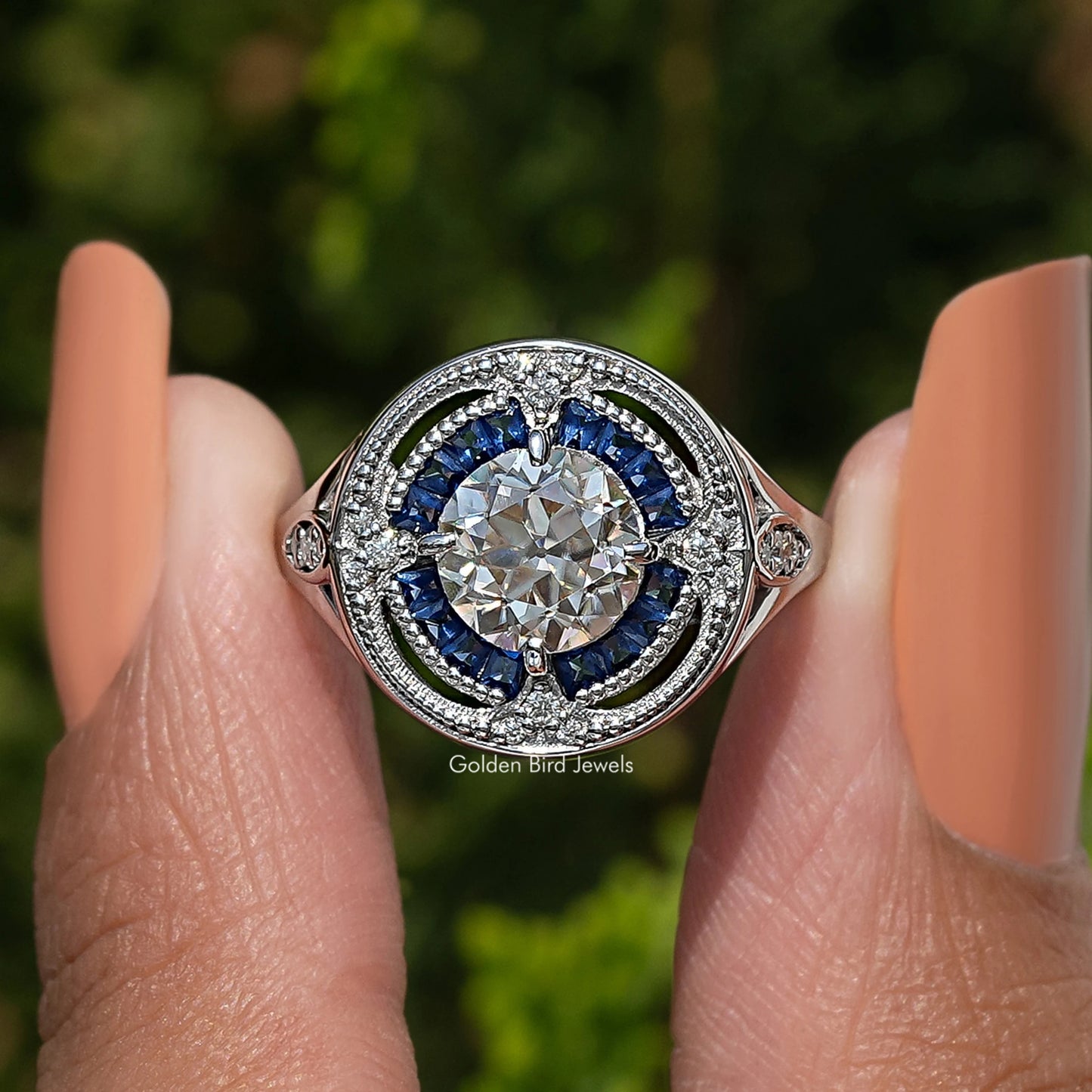 Old European Round And Tapered Baguette Halo Ring