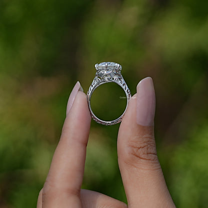 Back View of Old European Cut Round Moissanite Vintage Ring In two fingers