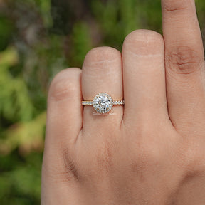 In finger view of Round Cut Moissanite Engagement Ring 