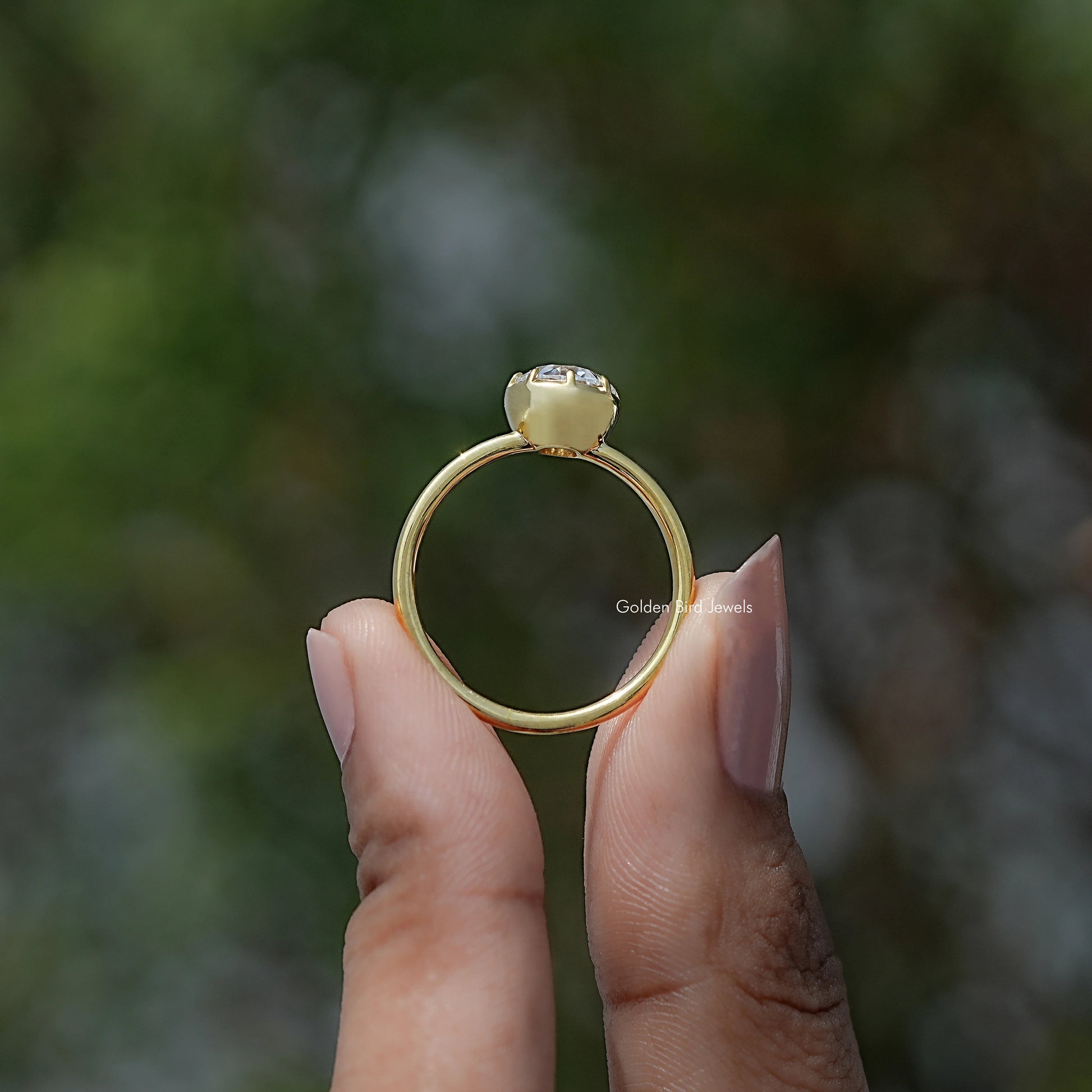 Back view of European Cut Moissanite Solitaire Ring in secure setting 