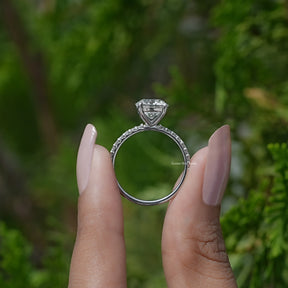 Back View of Round Cut Diamond Engagement Ring in two fingers