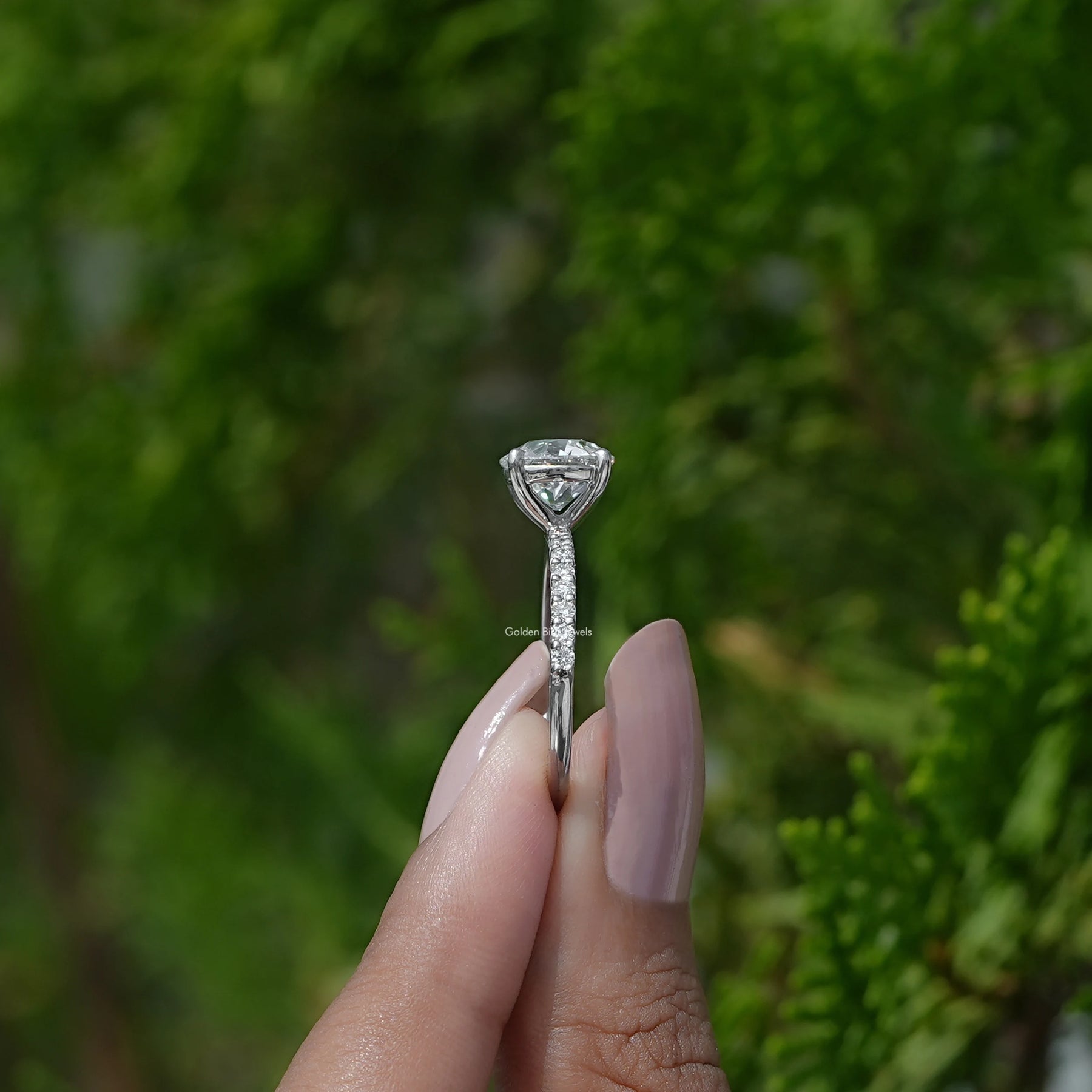 Side View of  Old European Round Diamond Ring on two fingers