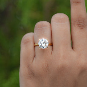 In finger view of Round Cut Solitaire Engagement Ring