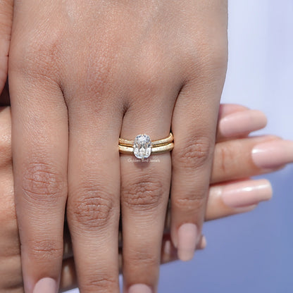 In hand Showing View Of Old Mine Cushion Cut Ring Set 
