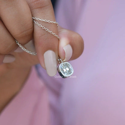 Side view of cushion cut pendant In white Gold
