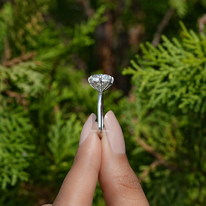 Side View of Old Mine Cushion Cut Moissanite Ring In two fingers