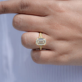 Close View Of Emerald Cut Accent Stone Ring
