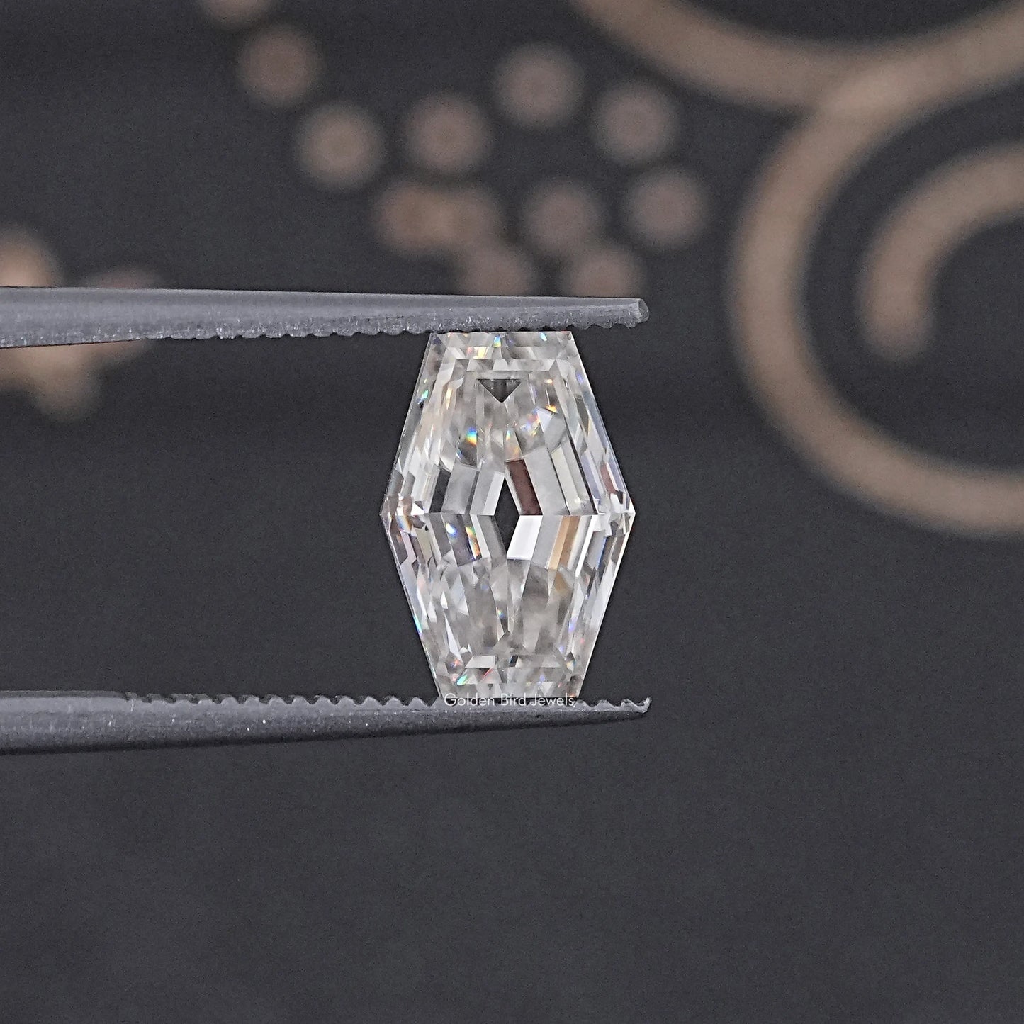 In Tweezer View Of Old Mine Lozenge Cut Loose Moissanite Stone