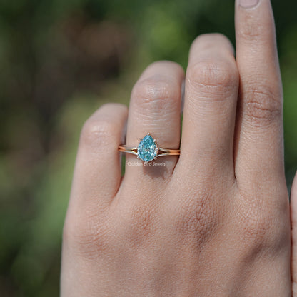 In finger front view of Pear Cut Moissanite Engagement Ring 