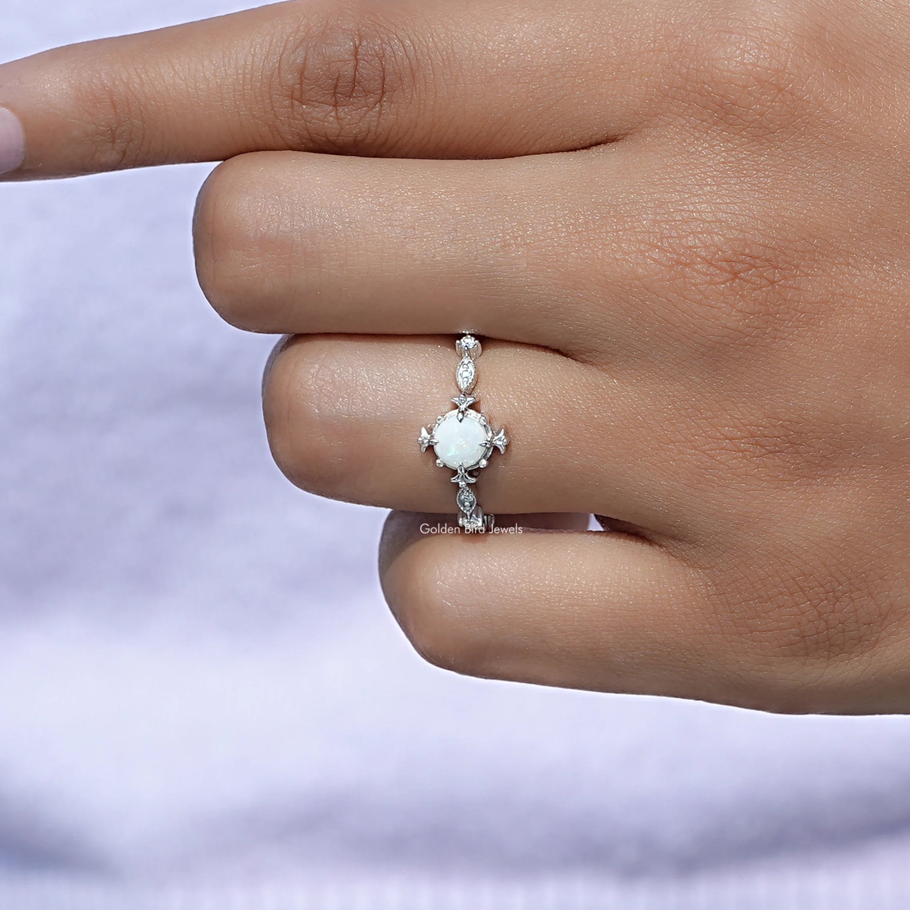 View of Opal Round Cut Gemstone Engagement Ring In White Gold 