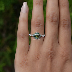 View of Oval Cut Gemstone Engagement Ring In Finger