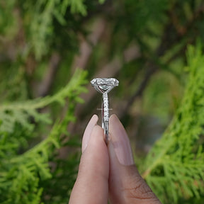 Side View of Oval Shaped Lab Diamond Solitaire Ring on two fingers