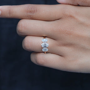 Detailed view of Oval Cut Lab Diamond Three Stone Ring