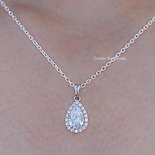 Close up view of Lab Grown Pear Cut Halo Pendant In White Gold