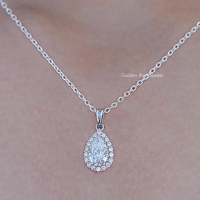 Close up view of Lab Grown Pear Cut Halo Pendant In White Gold