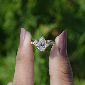 Pear Shaped Moissanite Accent Engagement Ring