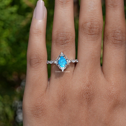 Detailed View of Pear Shape Gemstone Accent Ring In White Gold