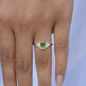 Detailed View of Green Emerald Cut Gemstone Accent Set Ring In White Gold