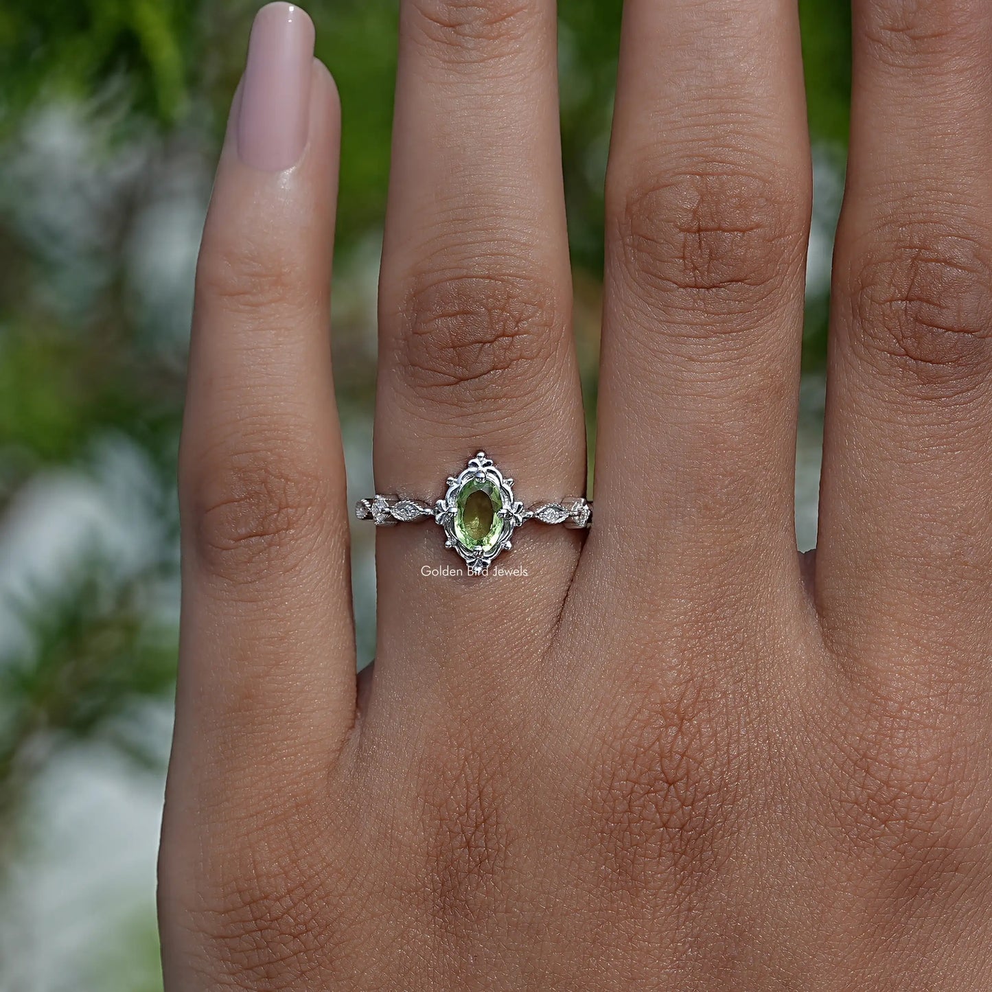 Detailed View Of Oval Cut Accent Stone Engagement Ring