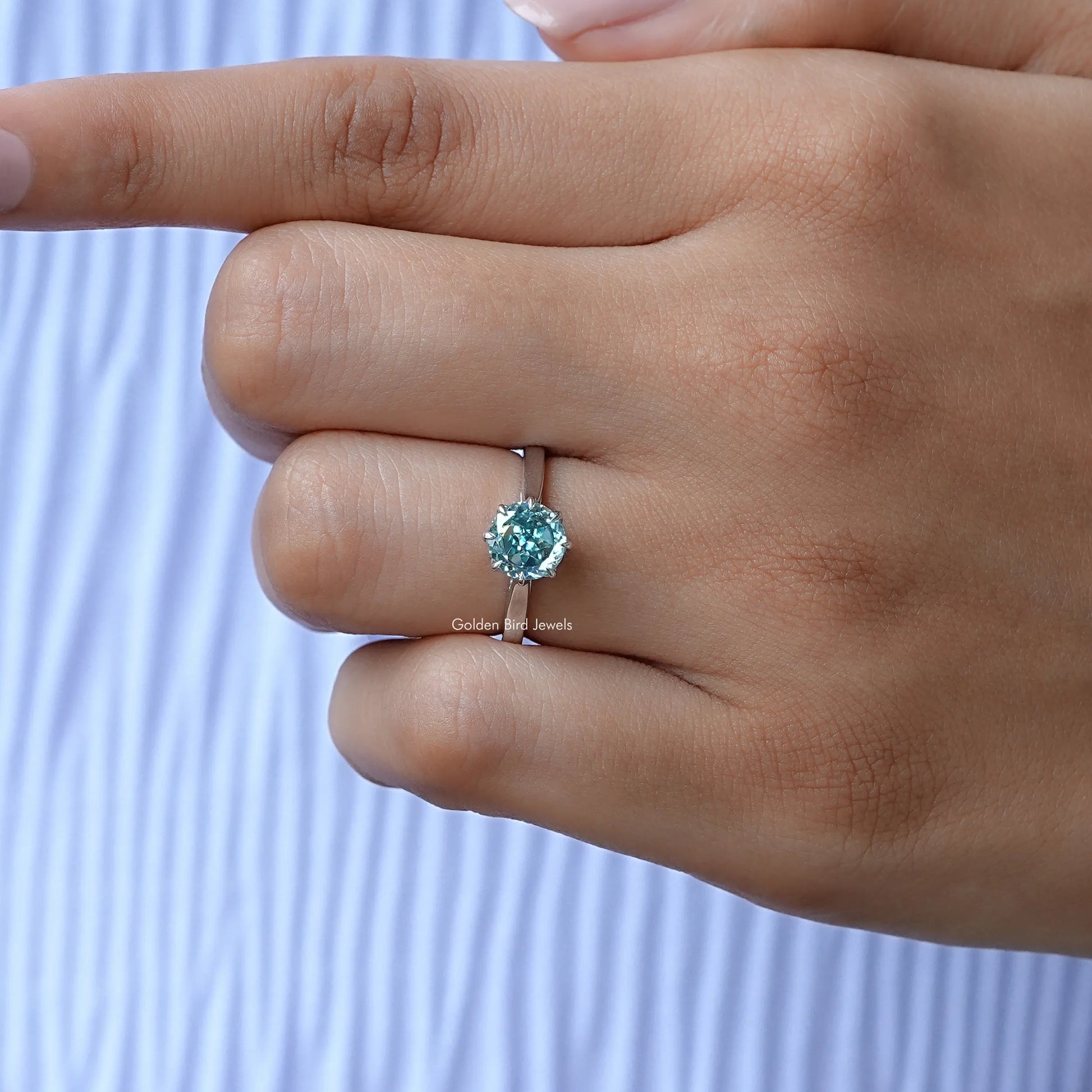 Round Cut Moissanite Ring In finger