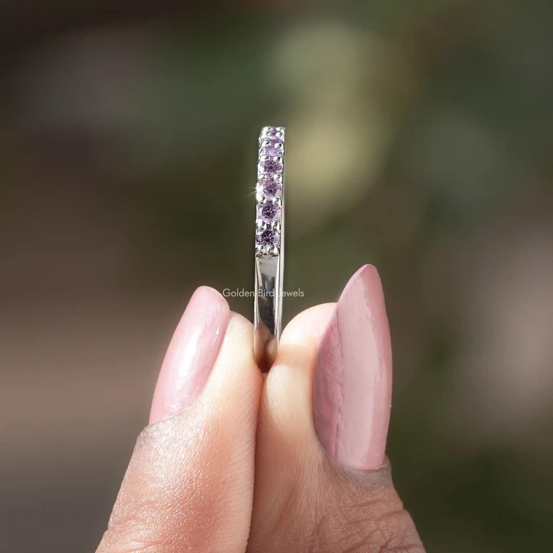 Side View of Purple Alexandrite Round Gemstone Eternity Band	