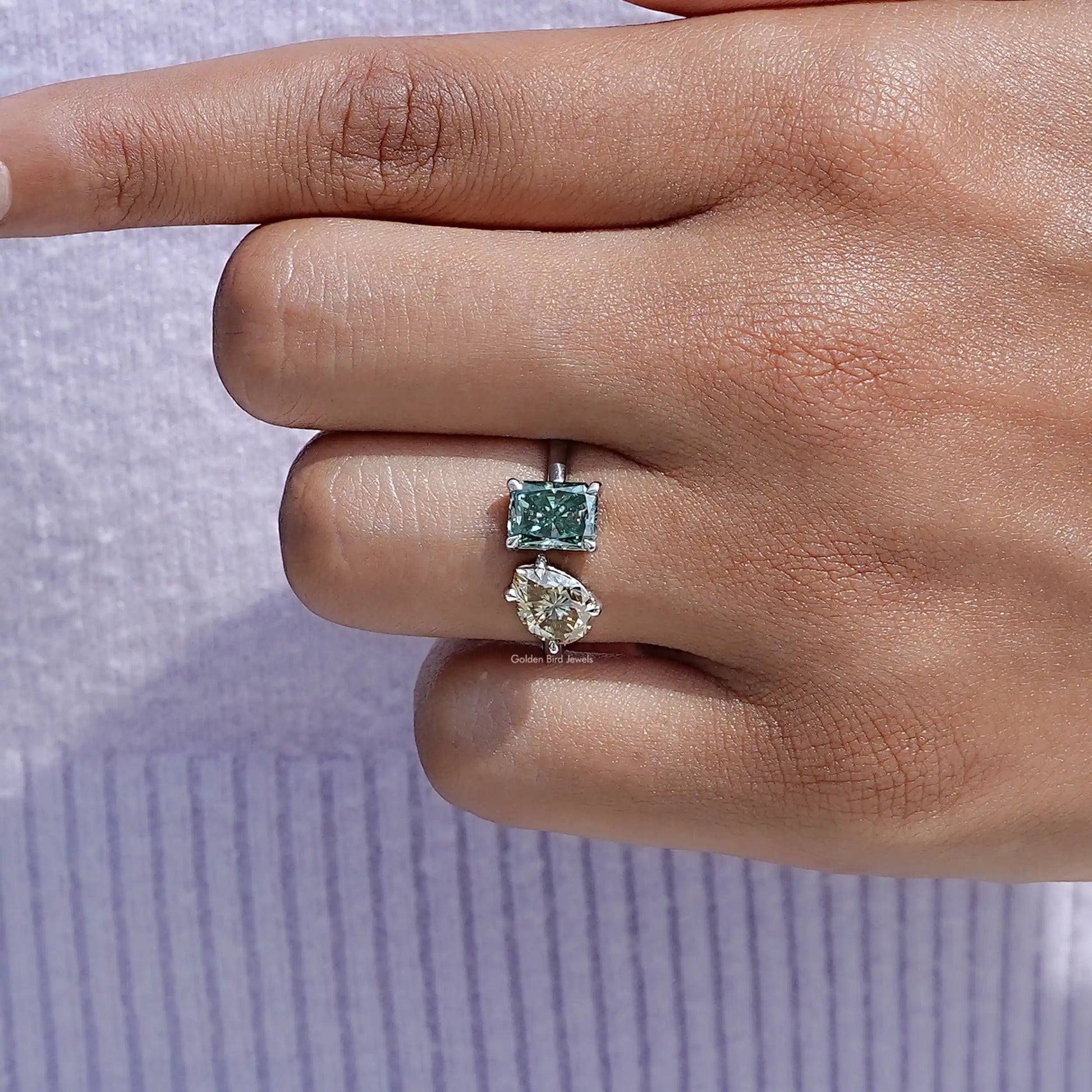 Close-Up View of Radiant And Pear Two Stone Moissanite Ring In White Gold