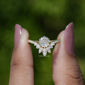 Front View of Round Cut Moissanite Curved Engagement Ring In two Fingers