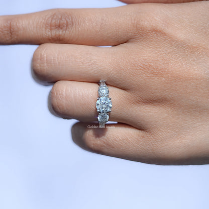 View of Round And Baguette Cut Diamond Five Stone Ring In White Gold
