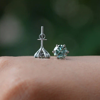 Front and back view of solitaire stud earrings crafted in moissanite 