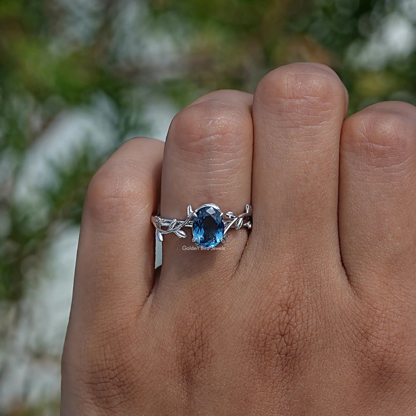 Profile View of Oval Cut Gemstone Engagement Ring