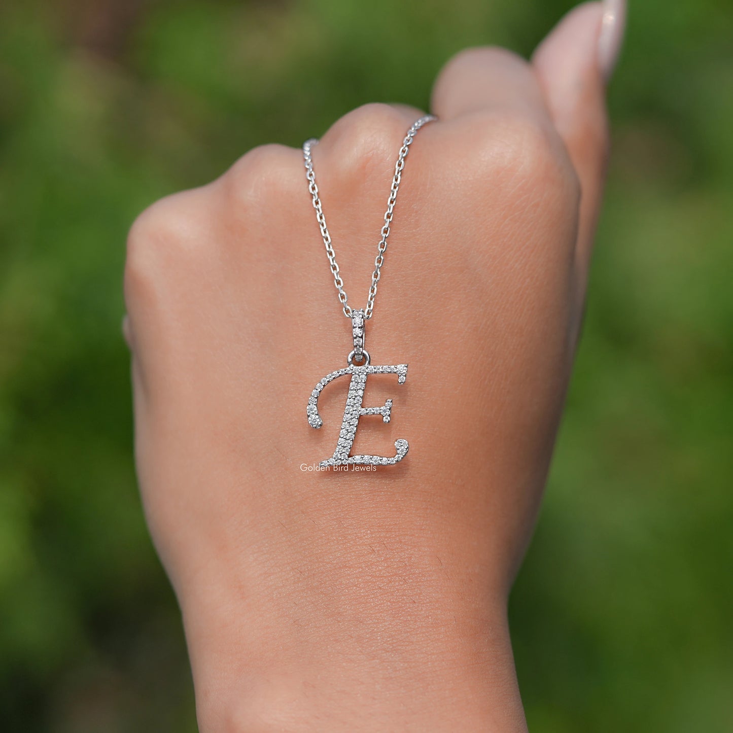 In hand Showing View Of Moissanite Solitaire pendant 