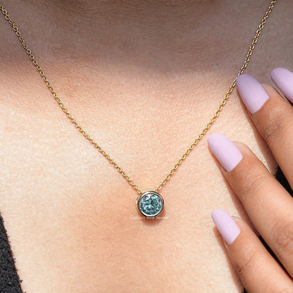 In neck view of aqua blue moissanite halo pendant 